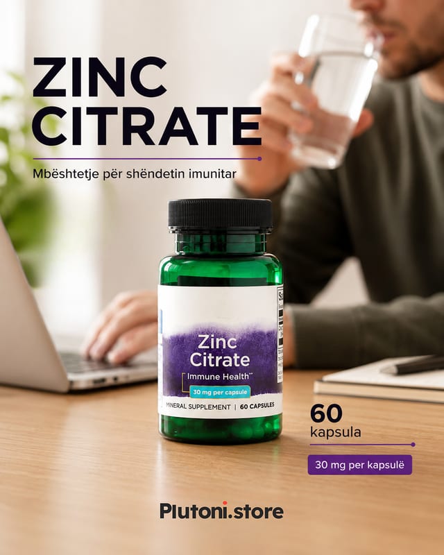 Shishe Zinc Citrate mbi tavolinë pune